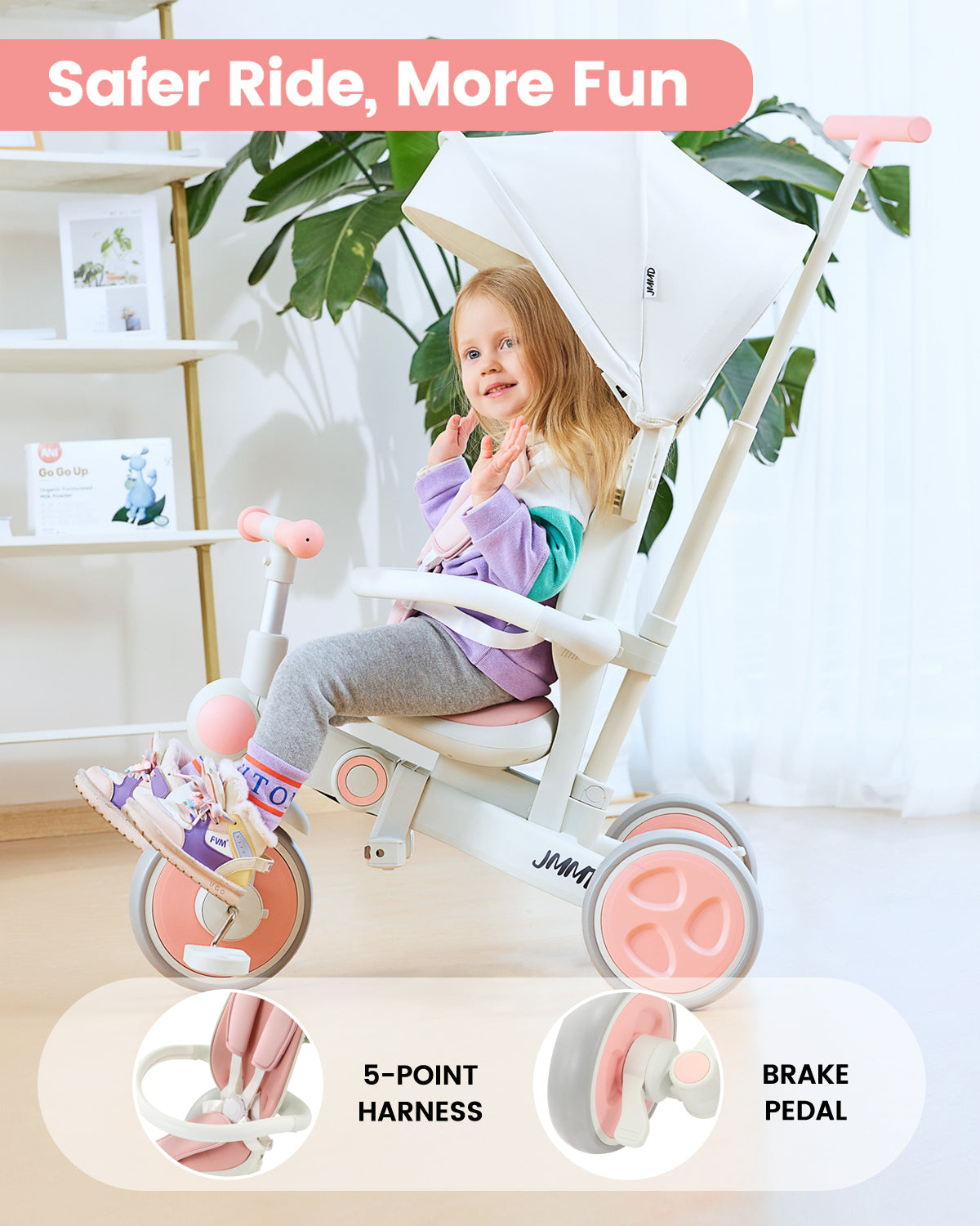 #color_blush-pink JMMD A7 toddler tricycle in Blush Pink showing 5-point harness, brake pedal, and safer ride features