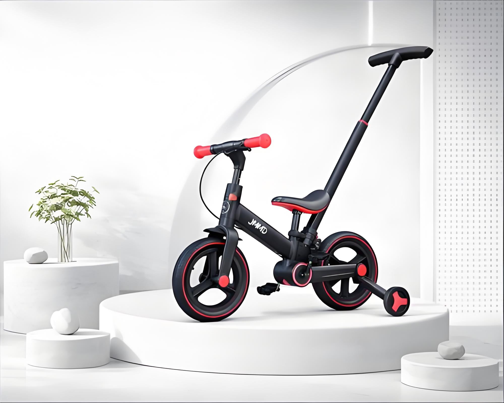 JMMD toddler tricycle in black and red displayed on clean studio background